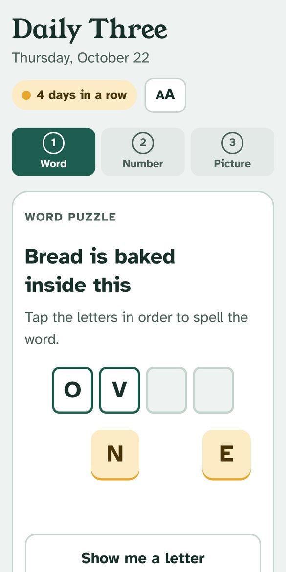 Word puzzle: the clue 'Bread is baked inside this', with letter tiles to spell OVEN